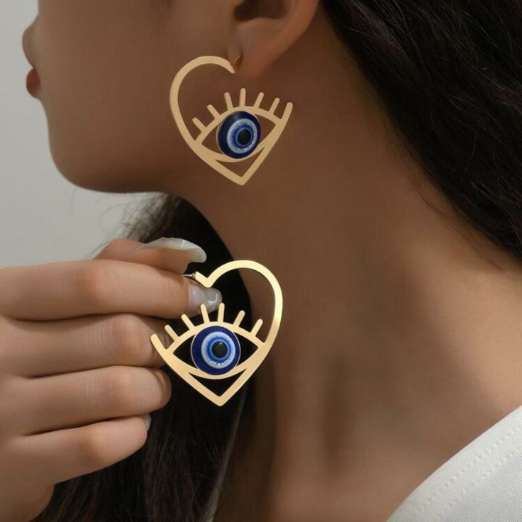 Material :Iron Earring Studs Material :Titanium Steel For All Occassions Gold Color With Blue Evil Eye Big Earrings Colorful Hoop Earrings, Party Hoop Heart Earrings For Pierced Ears, Party Hoop Heart Earrings, Valentine's Day Party Pierced Hoop Earrings, Valentine's Day Party Hoop Earrings Pierced, Heart-shaped Metal Hoop Earrings For Parties, Blue Heart Earrings For Party, Jewellery Brand, Evil Eye Earrings