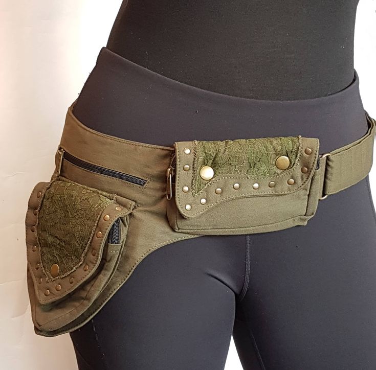 Utility pocket belt in army green Adjusts to 48 inch hip/waist measurement. Gold tone metal hardware & lace detail. 5 pocket design. Have your hands free while on the go! Biking, shopping, at concerts & events, traveling, biking & more. Fantastic gift for a friend or family member. See my whole collection of pocket belts here: https://www.etsy.com/ca/shop/VintageindiaCA?ref=seller-platform-mcnav&section_id=34445559 Exactly as shown in photos. What you see is what you get. In stock and ready to s Green Utility Bags With Pockets, Green Utility Bag With Pockets, Military Style Green Bags With Pockets, Military Green Bags With Pockets, Military Style Khaki Bag With Pockets, Khaki Military Style Bag With Pockets, Steampunk Utility Belt, Travel Money Belt, Rave Dance