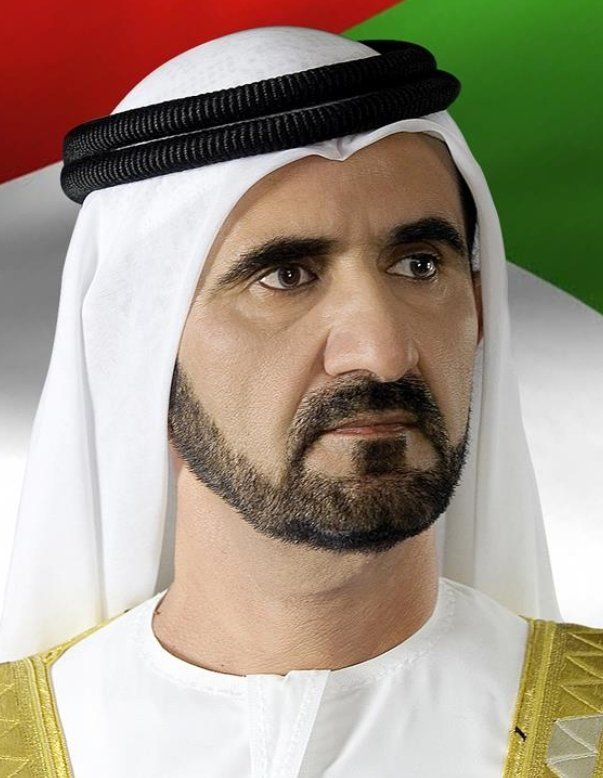 a man with a goatee on his head in front of the flag of jordan