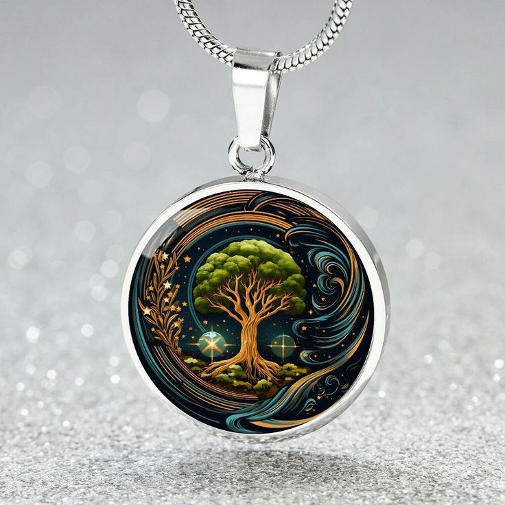 "Tree of Life Necklace is a celestial masterpiece with an intricately designed Tree of Knowledge, symbolizing the interconnectedness of the universe. This personalized charm pendant, reminiscent of the World Tree in astrology, embodies the beauty of galaxy jewelry, making it the perfect celestial gift for any occasion. ➜ Our Tree of Life Jewelry is made of high quality surgical steel with a graphic image that's printed directly onto the steel surface with a shatterproof liquid glass coating and Celestial Engraved Jewelry As Gift, Moon Phase Spiritual Jewelry, Celestial Round Collectible Necklaces, Nature-inspired Round Etched Jewelry, Celestial Style Engraved Pendant Jewelry, Spiritual Stainless Steel Jewelry, Spiritual Stainless Steel Jewelry Round Shape, Symbolic Medallion Jewelry For Memorial, Spiritual Engraved Round Jewelry