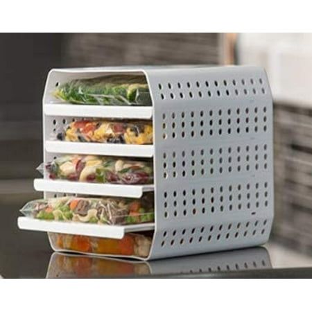 the food tray is stacked high on top of each other and has four sections for storage