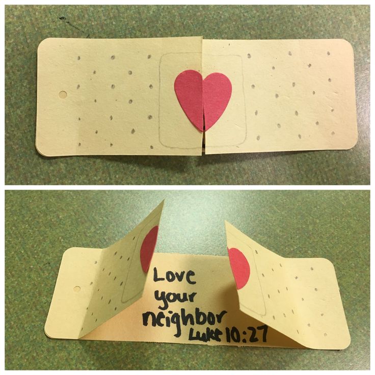 two pieces of paper that have been cut out to look like a card with a heart on it