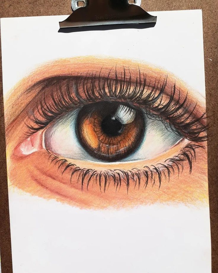 a clipboard with an eye drawn on it