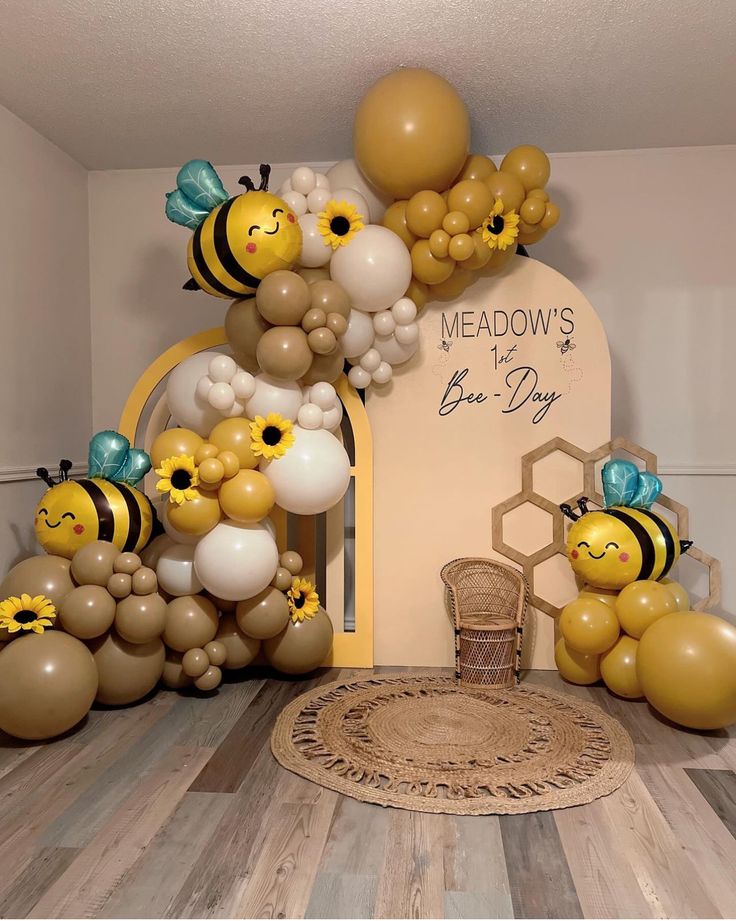 some balloons are in the shape of bees