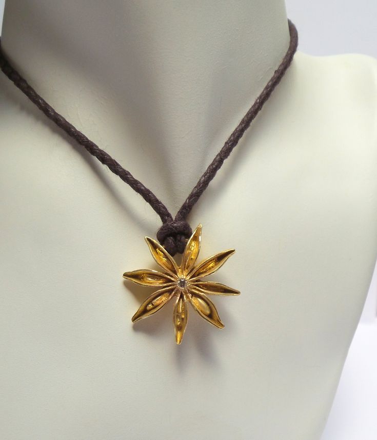 Star Anise Pendant - This beautiful and Special 14K solid Gold pendant Inlaid Diamonds . Handmade lock easy to wear! The pendant size is 30 mm. The pendant is 9gr 14k gold. The Cotton Chain . Free Shipping!! The necklace will be packed in a gift box and is ready to be given as a gift or kept for yourself. Your item will be shipped via registered air mail with tracking number. Please contact me with any questions or requests. Unique Gold Star-shaped Jewelry, Unique Gold Star Shaped Jewelry, Handmade Star-shaped Gold Necklace, Handmade Gold Star Necklace, Handmade Star-shaped Yellow Gold Necklaces, Handmade Yellow Gold Star Necklaces, Necklace Star, Silver Diamond Necklace, Pendant Diamond