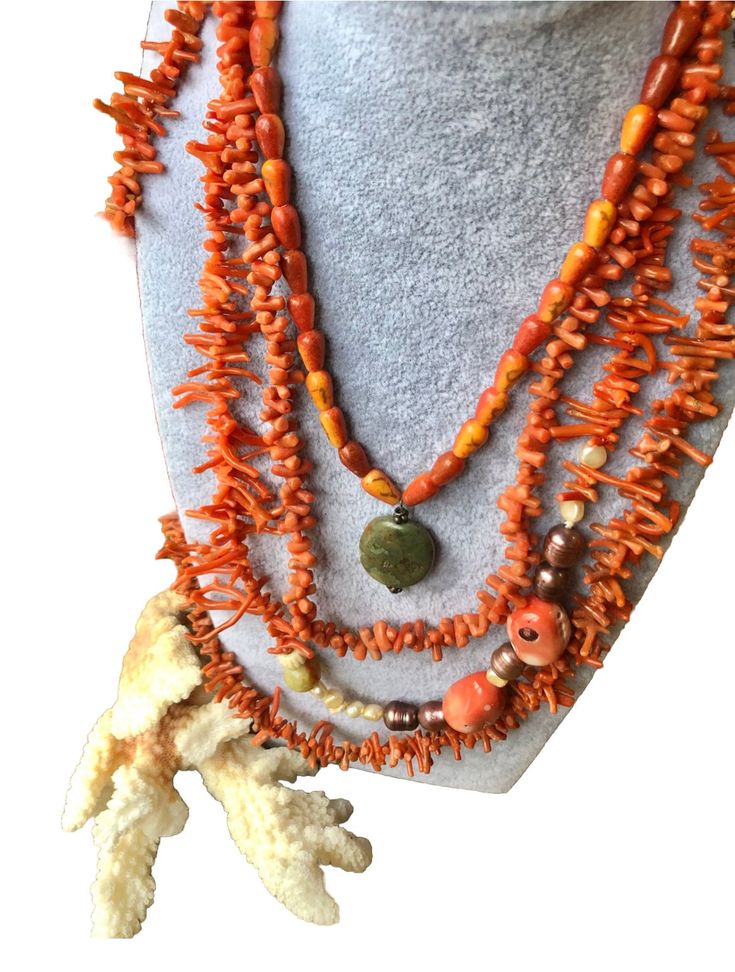 Lot of 4 vintage coral Stacked necklaces natueal earth Boho Necklaces These are all Mediterranean Cora Vintage and one of them has two very valuable large chunks.  It also has pearl + jade + bone Beautiful Stacking combination Valued over $440.00 Traditional Coral Necklace With Gemstone Beads, Artisan Hand-strung Red Coral Necklace, Spiritual Orange Necklace Made Of Red Coral, Spiritual Orange Red Coral Necklace, Unique Hand-strung Multi-strand Necklace, Orange Gemstone Beads Necklace In Red Coral, Traditional Multi-strand Red Coral Necklaces, Bohemian Hand-strung Red Coral Necklaces, Traditional Multi-strand Red Coral Necklace