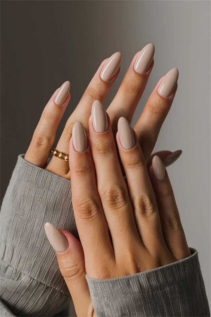 Discover the beauty of minimalist elegance with these simple nail ideas featuring neutral plain colors. This chic nail style combines soft taupes and creamy whites for a polished, sophisticated finish. Perfect for any occasion, these understated hues not only enhance your natural beauty but also offer versatility for both casual and formal settings. Embrace this timeless look and let your nails shine effortlessly. Nails Inspiration Light Colors, Minimalist Nails Neutral Colors, Classy Nail Paint, Neutral Nails No Design, Simple Soft Nails, Neutral Fall Transition Nails, Neutral Color Design Nails, Taupe Wedding Nails, Nail Ideas Chic