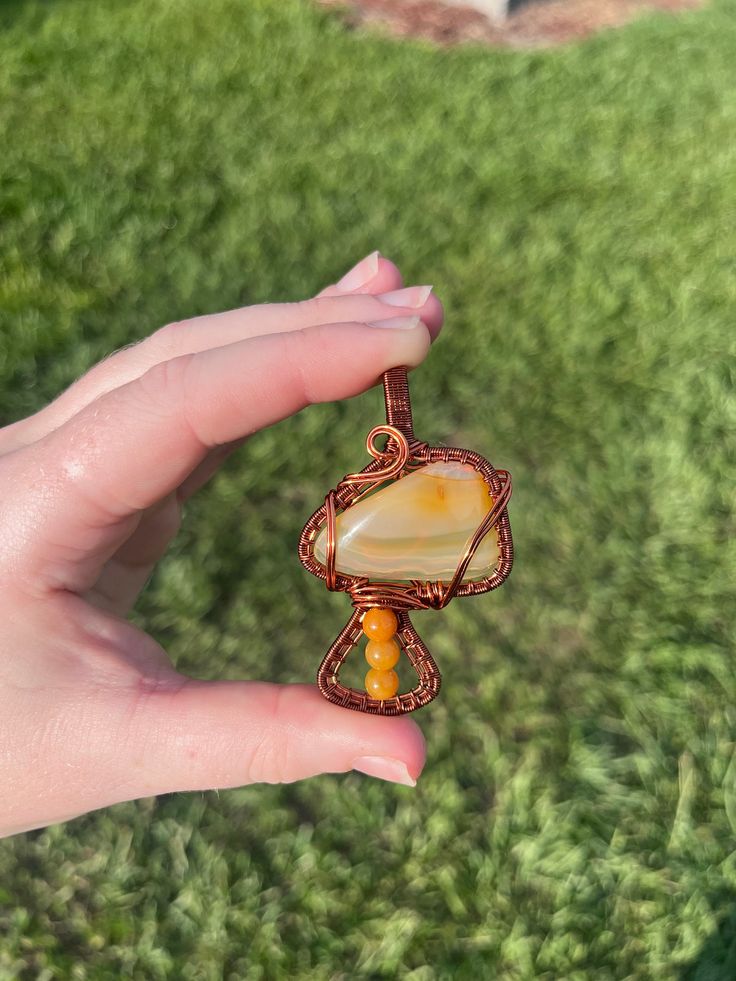 Beautiful banded agate mushroom with carnelian accents. This piece is calling to be claimed and find its forever home🫶🏻 Mushroom Pendant, Banded Agate, Forever Home, Pendant Necklaces, Jewelry Necklace Pendant, Agate, Stuffed Mushrooms, Jewelry Necklaces, Accessory Gift