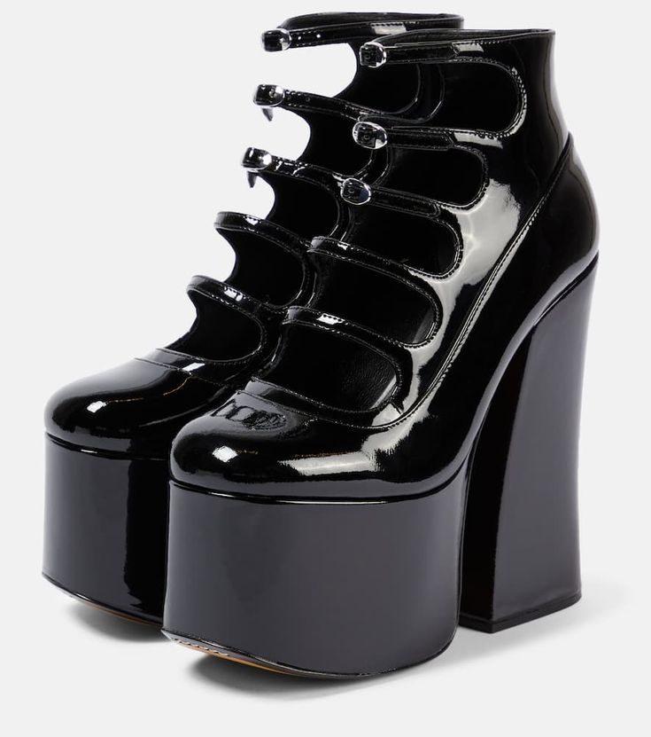 Find MARC JACOBS Kiki Patent Leather Platform Ankle Boots on Editorialist. Upper: calf leather. Lining: leather, fabric. Sole: leather insole and sole. Toe shape: round toe. Made in China. Includes: shoe box, dust bag. Closure: buckle fastening. Leather High-top Heeled Boots With Chunky Platform, Leather High-top Chunky Platform Heeled Boots, Edgy Patent Leather Ankle Heeled Boots, Edgy Patent Leather Ankle Boots, Black Calf Leather Platform Boots With Rubber Sole, Edgy Leather Heeled Boots With Chunky Platform, Edgy Black Leather Heels, Party Leather Platform Boots With Chunky Platform, Patent Leather Platform Heeled Boots With Pointed Toe