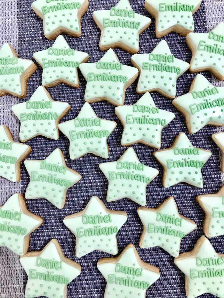 decorated cookies are arranged in the shape of stars