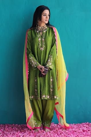 Mehendi green kurta with sequin, thread embroidery in floral pattern on placket. Paired with salwar and bandhej print dupatta. - Aza Fashions Festive Slub Silk Lawn Suit With Chikankari Embroidery, Traditional Green Sharara For Designer Wear, Green Unstitched Anarkali Set For Transitional Season, Green Sharara With Straight Kurta For Eid, Straight Kurta Lawn Suit With Mirror Work In Mulmul, Green Bollywood Churidar With Zari Work, Semi-stitched Green Traditional Wear For Festivals, Green Anarkali Set In Mulmul, Festive Designer Wear Pista Green Lawn Suit