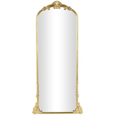 an ornate gold framed mirror on a white background