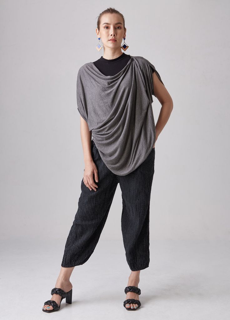 "🚚..ALL ORDERS ARE SHIPPED VIA DHL EXPRESS MAIL Incredibly comfy to wear all day, evening and night, great over pants, skirt or just about anything else; instant style that is both practical and easy to wear. A deep cowl neckline mimics the rounded, uneven hem, giving a loose-fitting a casual ease. The fold-over collar comes to crisp points, the neckline has a buttonhole and two buttons that allows you to change the drape of the collar. This makes the shirt versatile to wear and a precise pleat Drapey Asymmetrical Summer Tops, Versatile Draped Summer Top, Relaxed Fit Asymmetrical Tops For Layering, Slouchy Top For Summer Layering, Summer Layering Top With Relaxed Fit, Summer Slouchy Tops For Layering, Versatile Draped Tops For Spring, Asymmetrical Cotton Top With Relaxed Fit, Casual Drapey Tops For Layering