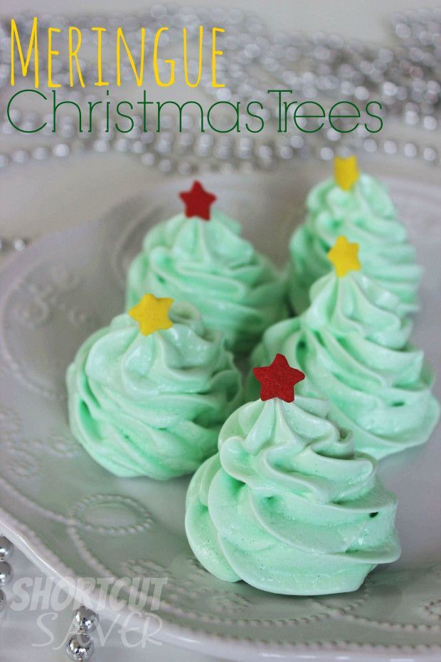 green meringue christmas trees on a white plate