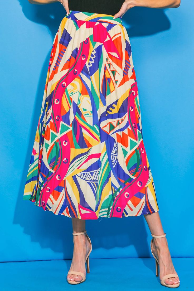 A woven printed midi skirt featuring fully pleated and side zipper closure. Matching top IT12335 Details Self: 100% Polyester Lining: 100% Polyester Size & Fit - Model is 5`8 " And Wearing Size Small - Measurements Taken From Size Small - Approx. Length: 35" Bohemian Style Lined Midi Skirt, Bohemian Midi Length Lined Skirt, Trendy Long Skirt For Summer, Trendy Relaxed Midi Skirt, Trendy Summer Maxi Skirt Relaxed Fit, Trendy Flowy Full Skirt Bottoms, Spring Asymmetrical Relaxed Maxi Skirt, Trendy Relaxed Maxi Skirt For Summer, Spring Pleated Asymmetrical Maxi Skirt