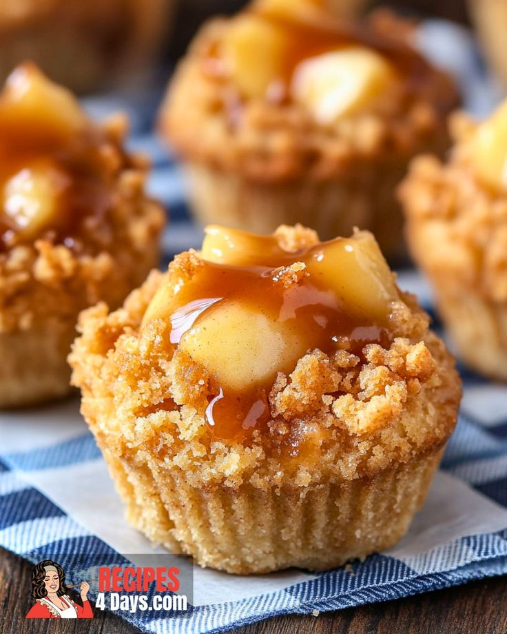 small cupcakes with caramel topping on a blue and white checkered napkin