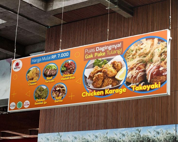 an orange sign hanging from the side of a building with pictures of different food items on it