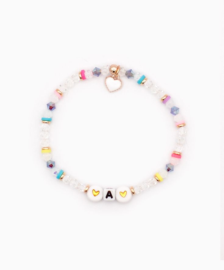 Mother's Day Bracelet, Initial Bracelet, Mom Gift This bracelet is made with Czech crystals of clear and violet AB lustre. Colorful heishi beads and 18k gold plated hardware are spaced throughout.  A tiny white enamel heart charm hangs at the closure.   This is a stretch bracelet made with durable stretch cord.  If you are unsure of what size to buy, I suggest Medium 6.75" as this is average for most women. Please leave initials you would like. Maximum 5. I can space the letters with either crys Multicolor Heart Beads Bracelets For Mother's Day, Adjustable Multicolor Heart Bracelet With Letter Beads, Adjustable Heart Beads Bracelet For Birthday, White Name Bracelet With Colorful Beads For Mother's Day, Adjustable Jubilee Bracelet For Mother's Day, Personalized White Crystal Bracelet Adjustable, Mother's Day White Name Bracelet With Colorful Beads, Adjustable Crystal Bracelet With Letter Beads For Friendship, Multicolor Letter Beads Bracelets For Mother's Day