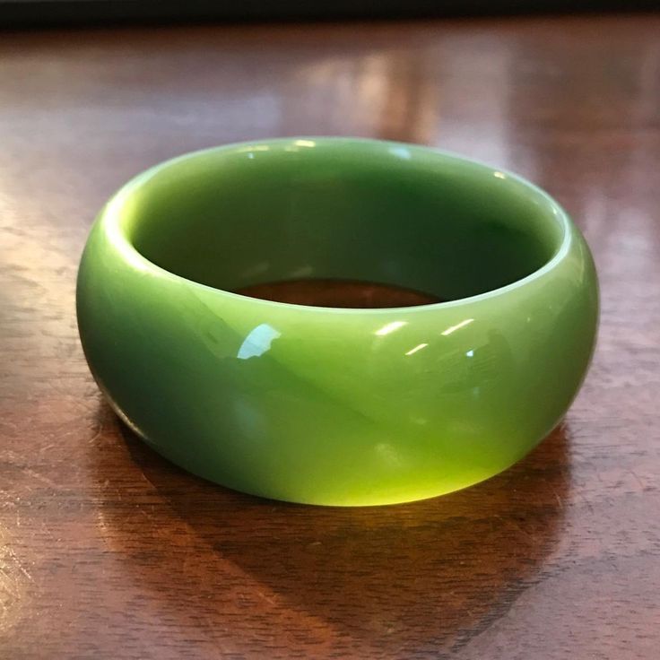 Exceptional Siberian Jade light green Bangle. Unfortunately there is a fracture that goes through half of the bangle (picture with the light coming through the bangle) Measures approximately 53.65 x 24.7 Fantastic deal at this price due to the fracture Modern Green Cuff Bangle Bracelet, Green Bangle Bracelet For Formal Occasions, Green Bangle Bracelets For Formal Occasions, Formal Green Bangle Bracelets, Unique Green Bangle Bracelet, Modern Green Bangle Jewelry, Spiritual Green Bangle Cuff Bracelet, Green Carved Bangle Bracelets, Unique Green Cuff Bangle Bracelet