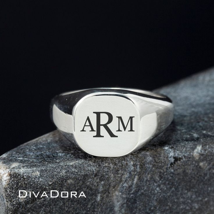 "We designed this signet ring with the look and feel of a true designer piece. The substantial weight of the solid 925 sterling silver and smooth curved edges make this a ring you will love to wear or gift with pride. We craft each piece to order and perform the laser engraving in our Los Angeles workshop. Since we control every step of the creation our team can craft a custom ring for you in only a few days! We can engrave the ring with a monogram, a single initial or work with you to create a Symbolic Stamped Signet Ring In Sterling Silver, Symbolic Sterling Silver Stamped Signet Ring, Symbolic Stamped Sterling Silver Signet Ring, Silver Modern Signet Ring With Engraving Option, Modern Silver Signet Ring With Engraving Option, Classic Silver Initial Ring For Formal Occasions, Classic Oval Stamped Signet Ring, Silver Stamped Symbolic Signet Ring, Stamped Sterling Silver Signet Ring