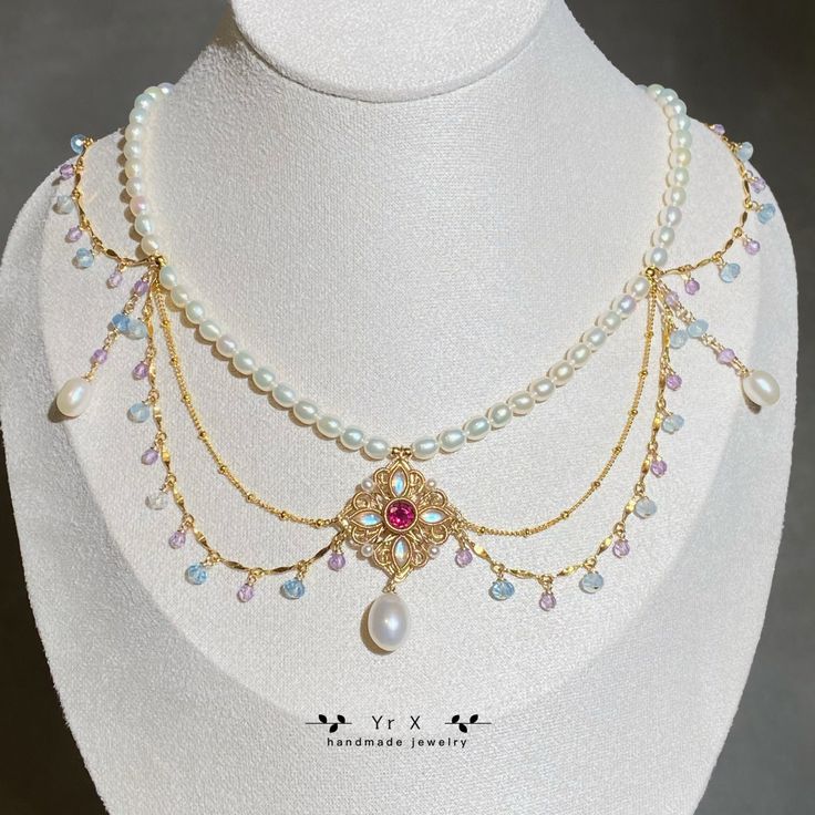 "Material: Natural White Freshwater Pearl                  Natural Rainbow Moonstone                  Natural Pyrope Garnet                  Natural Amethyst                  Natural Aquamarine                  14K Gold Filled            Size: Pearl 4.5-5mm,6.5-8.5mm             Moonstone 3*6mm                 Pyrope Garnet 6mm             Amethyst 3mm             Aquamarine 4-4.5mm Necklace length: 15\" with 3\" extender chain (adjustable 15\"-18\")                                                      White Pearl Quality:origin China,strong light,basically flawless This amazing necklace is inspired of the Victorian era and the vintage great necklaces. Fascinated necklace for your special day. I can only imagine this on some special girl's neck on her wedding day. Let your imagination run Baroque Necklaces With Historical Design For Wedding, Baroque Necklace With Historical Design For Weddings, Baroque Wedding Necklace With Historical Design, Baroque Historical Design Necklace For Wedding, Heirloom Baroque Jewelry For Weddings, Heirloom Pearl Pendant Necklace For Wedding, Pearl White Gemstone Necklace For Wedding, Elegant Wedding Necklace With Historical Design, Baroque Pearl Necklace For Wedding