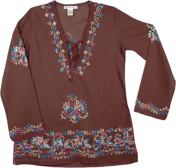 Brown Cotton Shirt with Embroidery - A little bit of bohemian style and a lot of embroidery highlight this flowing tunic with full length sleeves and hem vents. Simply adorable style! Great for this season with a vest and jeggings or jeans. The material is lightweight woven cotton slightly sheer, you'll have to wear it with a cami. The sexy deep V-shaped neckline has a tasseled tie. This tunic shirt is all about elegant construction, a comfortable flowing fit and a beautiful way to wear a curren Bohemian Outfits Summer, Shirt With Embroidery, Embroidered Tunic Top, Hippie Look, Trendy Skirts, Scarf Shirt, Summer Fashion Dresses, Boho Shirts, Embroidered Tunic