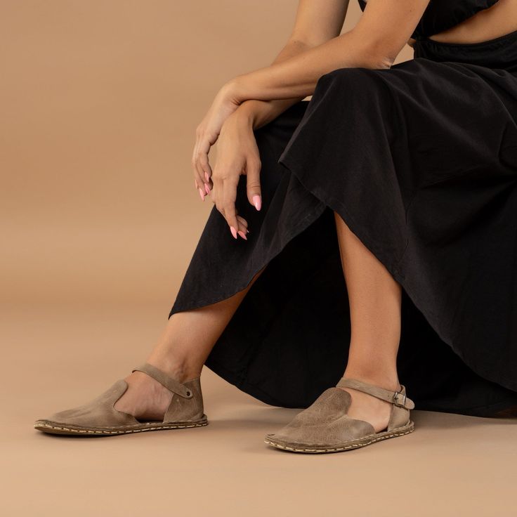 Step out in style and comfort with our Tan Closed Toe Barefoot Sandals! Handmade with 100% natural leather, these sandals feature a natural leather upper and lining, and a water buffalo leather sole that's perfect for all-day wear. The "zero-drop" non-elevated heel ensures proper posture while the wide toe boxes give your toes enough room to spread and relax. To ensure the perfect fit, use our easy-to-follow size chart and measure your foot to find the right size. With next day shipping and free Closed Toe Sandals With Leather Sole, Ankle Strap Espadrilles With Buckle Closure, Beach T-strap Sandals With Leather Sole And Open Heel, Closed Toe Suede Espadrilles With Stitched Sole, Beige Leather Footbed Sandals With Round Toe, Suede Closed Toe Espadrilles With Stitched Sole, Leather Flats With Cushioned Footbed And Single Toe Strap, Suede Closed Toe Espadrilles With Rubber Sole, Suede Closed-toe Espadrilles With Rubber Sole