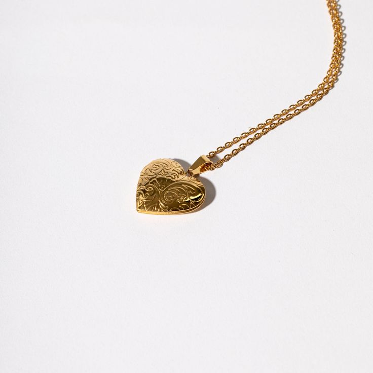 This incredible piece is a functioning locket for the keepsake of your loved one's image or locket of hair. Solid gold versions of this style sell for upwards of thousands of dollars. Ours looks, feels and wears exactly the same for a fraction of the cost. The ultimate gift anyone will adore and cherish for life. The Pendant is durable and functions as an open and close locket. So that you may store a photo or lock of hair inside. It is cleverly crafted to be lightweight, so that every day wear Locket Chain, Lock Of Hair, Hair Locks, The Ultimate Gift, Heart Locket, One Image, Titanic, For Life, Locket