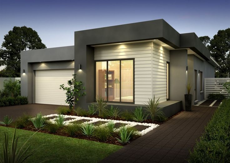 a modern house is shown at night with lights on the windows and plants in the front yard