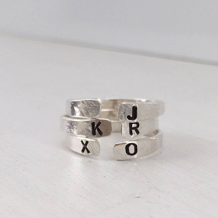 Our Personalized Open Cuff Ring might be small but it makes a mighty statement. This gorgeous minimalist style ring is perfect for stacking two, three, even four or layering with other ring styles. The fact that you can personalize it with initials and other designs just makes it even better, or leave it blank, it's totally up to you. Besides initials this piece can be personalized with numbers, heart, star or flower symbol. This ring is hand made and stamped in our studio at the time of order, Silver Initial Ring, Open Cuff Ring, Ring Name, Hand Stamped Ring, Stamped Ring, Flower Symbol, Stamped Rings, Name Ring, Ring Styles