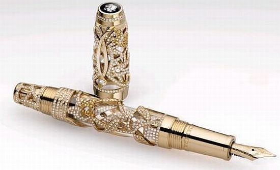 an ornate gold fountain pen on a white background