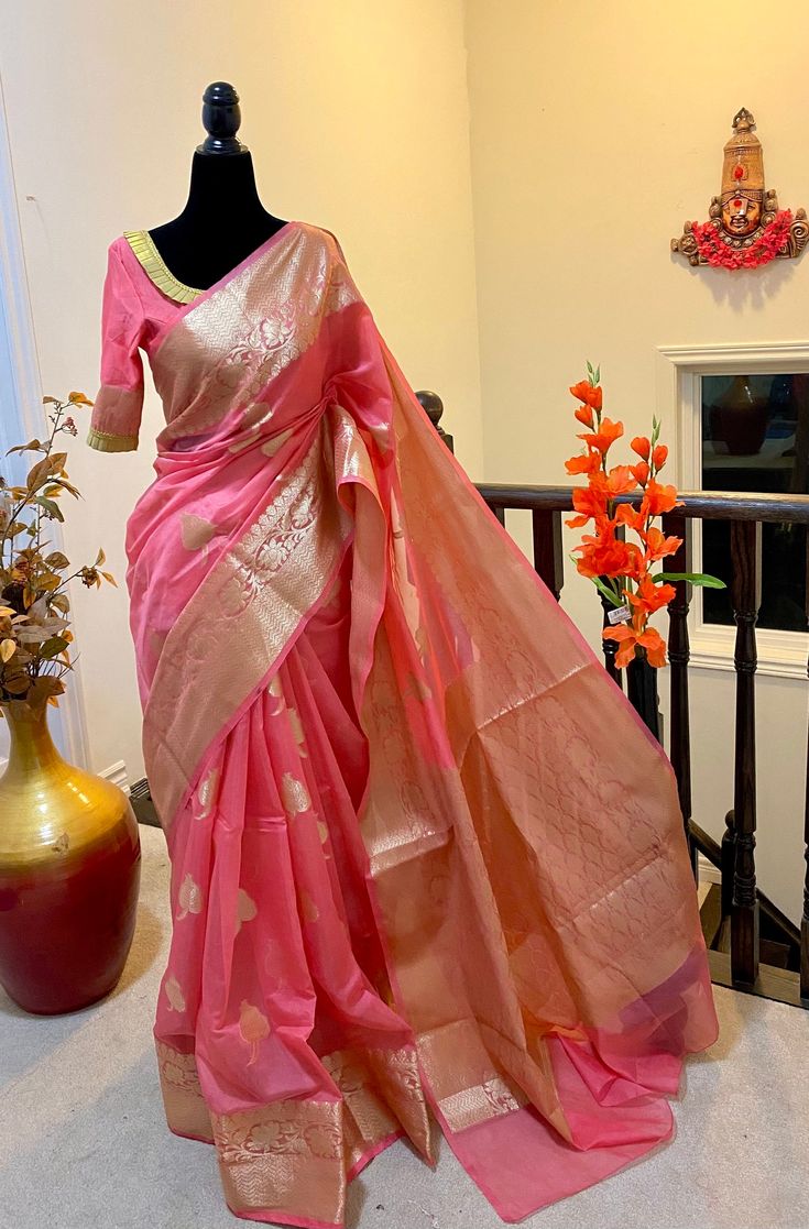 Beautiful Soft Banarasi kora organza saree  with beautiful color soft and easy to drape   paired up with ready to wear pretty designer blouse fits to 32 to 46 size saree is done with fall and pico ready to wear ! ideal for parties and occasions chek the video and chek the pictures for blouse design Organza Blouse For Designer Wear And Festivals, Organza Choli With Self Design, Organza Blouse For Diwali, Unstitched Organza Blouse For Diwali, Fitted Pre-draped Saree In Organza With Self Design, Elegant Organza Traditional Wear For Celebration, Fitted Organza Pre-draped Saree With Self Design, Anarkali Organza Blouse For Diwali, Traditional Tissue Silk Wear With Zari Weaving For Party