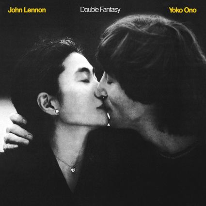 two people kissing each other in front of a black and white background with the words double fantasy written on it