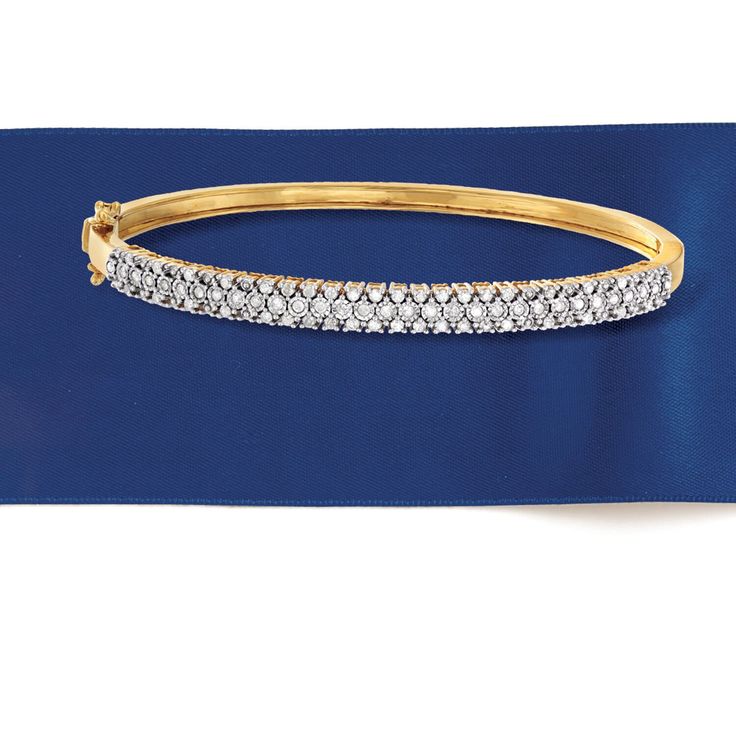 Ross-Simons - .75ct t. w. Diamond Bangle Bracelet in 18kt Gold Over Sterling. 8". You'll love our glimmering diamond bangle! In polished 18kt yellow gold over sterling silver, it flashes and flickers with three rows of round diamonds, totaling .75 carats. Wear it to the office or to date night. Double-latch safety. Box clasp, diamond bangle bracelet. Diamond birthstones are the perfect gift for April birthdays. Dazzling Diamond Bangle Bracelet With Pave Setting, Formal Pave Setting Diamond Bangle Bracelet, Dazzling Diamond Cut Bangle Bracelet, Formal Diamond Bangle Bracelet With Pave Setting, Formal Bangle Diamond Bracelet With Pave Setting, Fine Jewelry Diamond Accented Bangle Bracelet, Fine Jewelry Diamond Bangle Bracelet With Accents, Fine Jewelry Diamond Accent Bangle Bracelet, Fine Jewelry Diamond Bracelet With Accents