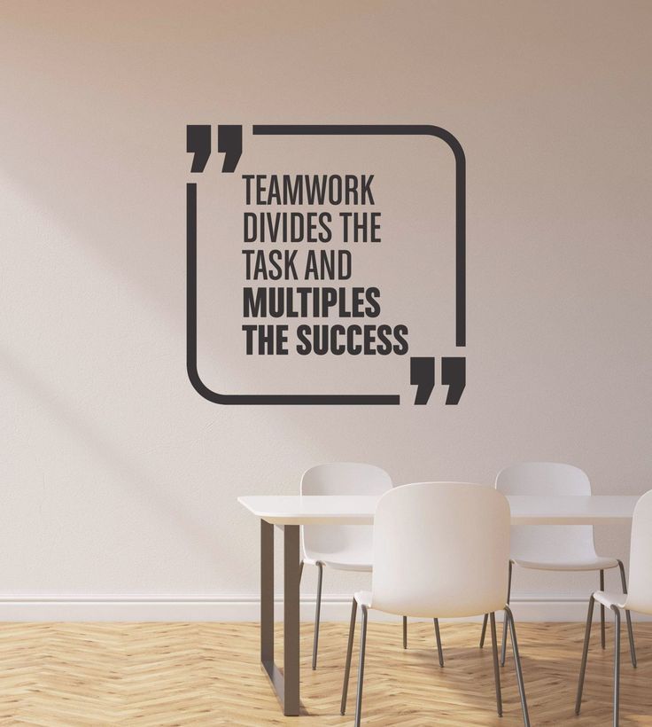 there is a quote on the wall that says teamwork divides the task and multiples the success