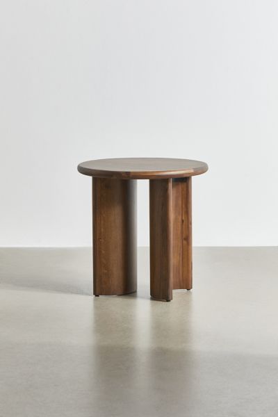 a round wooden table with two legs on the top and one leg in the middle