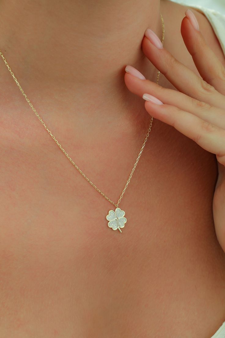 Gold Diamond Four Leaf Clover Shamrock Necklace, Delicate Lucky Flower Charm Necklace, Clover Nature Jewelry Our gold diamond necklaces are perfect choice for a Christmas, Mother's Day, valentine's day, birthday, wedding, anniversary, graduation, engagement, bridesmaid, and best friends gift. It's a good way to show appreciation to your mom, girlfriend, wife, grandmother, grandchildren, daughter, sister, best friend, boss or a co-worker. Also, a special treat just for yourself.   FEATURES * Soli White Flower Pendant Necklace With Clavicle Chain, Anniversary Flower Necklace With Clavicle Chain, Delicate Flower Shaped Necklace For Mother's Day, Flower Shaped Charm Necklace For Anniversary, White Flower Pendant Charm Necklace With Delicate Chain, Delicate Flower-shaped Charm Necklace For Anniversary, Fine Jewelry Flower Pendant Necklace For Mother's Day, Dainty White Flower Necklace As Gift For Her, Fine Jewelry Flower Pendant Necklace