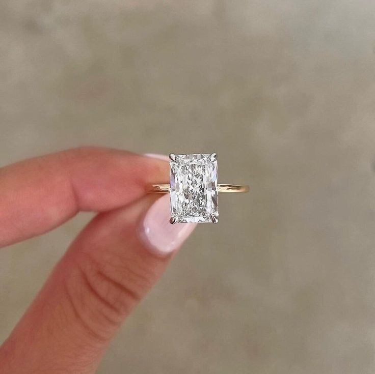 Unique Radiant Cut Solid Gold Hidden Halo Moissanite Engagement Ring in Two Tone, Big Solitaire Diamond Ring, Plain Band Proposal Ring for Her, Radiant Cut Engagement Ring, Radiant Hidden halo Ring, 3.39 carat Moissanite Ring, Simple Diamond Ring, Celebrity STyle Ring, Luxurious Party Wear Ring 💎 Center Moisanite Details 💎 ➤Shape: Radiant Cut Moissanite ➤Size: 3.39CT (approx.) ➤Measurement: 7x10mm (approx.) ➤Main Stone Clarity: VVS1 ➤Color: D E F ➤Cut Grade: Excellent ➤Moissanite Guarantee: Test Positive By Thermal Diamond Testers & lifeTime Brilliance ➤Hardness: Moissanite 9.25 💎 Side Moissanite Details 💎 ➤Shape: Round Cut Moissanite ➤Size: 0.11CTW (approx.) ➤Color: Colourless ➤Clarity: VVS 💍 Metals Details 💍 ➤Platinum/ Solid Gold / Sterling Silver ➤Metal Purity: 14K Gold / 10k Gold Radiant Engagement Ring And Wedding Band, Elongated Radiant Engagement Ring, Radiant Wedding Ring Set, Engagement Rings Radiant Cut, Engagement Ring Big, Two Tone Engagement Ring, Large Engagement Rings, Luxurious Party, Radiant Engagement Ring