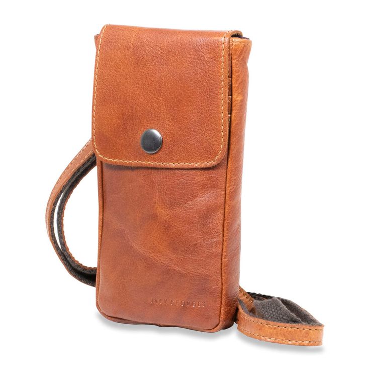 FREE MONOGRAMMING! HAND-STAINED BUFFALO LEATHER Make shopping, running errands, or traveling completely hands-free with this functional mini crossbody bag. The Voyager Phone Holder Crossbody is made from hand-stained Buffalo leather that builds a rich, deep patina as it ages. The front has card slots beneath a flap with snap closure. On the backside, an open pocket can hold your keys and other essentials. An adjustable shoulder strap allows you to wear it on your shoulder or across your chest. T Leather Mobile Phone Pouch For On-the-go, Leather Mobile Phone Bag Pouch For On-the-go, Leather Phone Pouch For On-the-go, Travel Crossbody Pouch In Soft Leather, Travel Phone Bag In Soft Leather, Classic Soft Leather Phone Bag For Travel, Cognac Travel Bag For Mobile Phone, Leather Travel Pouch With Adjustable Strap, Leather Crossbody Phone Bag For Travel