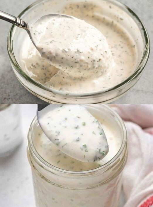 two jars filled with different types of sauces and one has a spoon in it