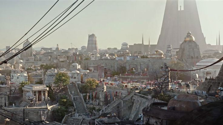 a city with lots of buildings and power lines