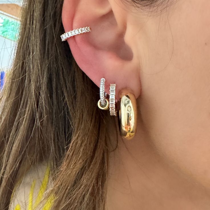 I pair these stunning huggies with the matching ear cuff. They're so elegant and shiny. Prong settings are one of my favorite styles and this sparkle proves it! Available in 14k yellow, rose, or white gold .53ctw diamond Outer diameter measures 15mm Inner diameter measures 10.5mm By EF Collection Yellow Gold Cubic Zirconia Huggie Cartilage Earrings, Diamond Halo Huggie Earrings, Luxury 14k Gold Huggie Earrings, Yellow Gold Diamond Huggie Earrings With Halo, Yellow Gold Huggie Diamond Earrings With Halo, Halo Huggie Earrings In 14k Gold, Gold Huggie Earrings With Halo In Fine Jewelry Style, Gold Halo Huggie Earrings Fine Jewelry, 14k Gold Huggie Halo Earrings