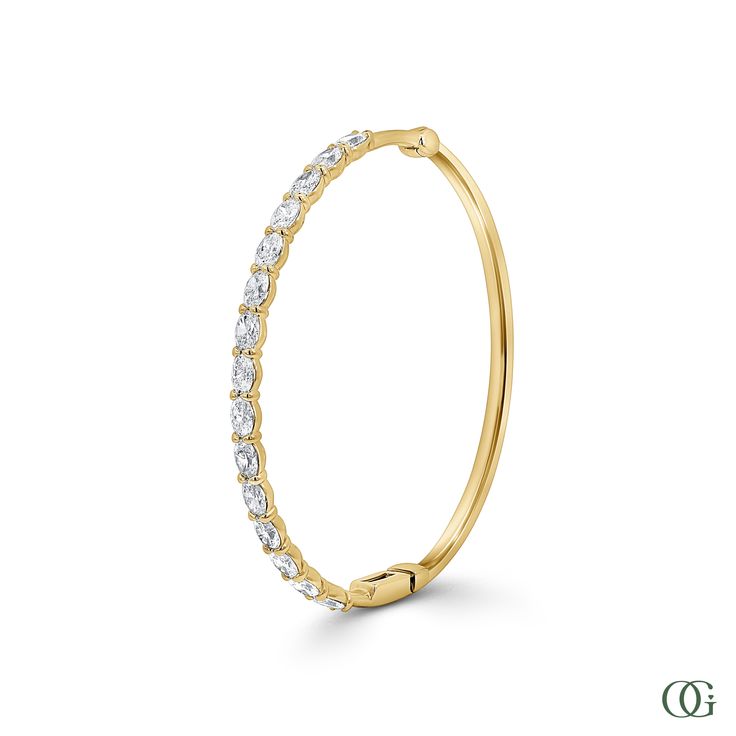 This Oval Diamond Bangle features an exquisite oval-shaped diamond set in a timeless design. Perfectly suited for any occasion, this stunning piece is sure to be treasured for years to come. The standard size is 7 inches; please note any other sizes are considered special order and may require additional time for production. Timeless Round Cut Gold Bracelet For Anniversary, Formal Oval Diamond Bracelet With Single Cut Diamonds, Classic Hand Set Bangle For Formal Occasions, Luxury Oval Diamond Bracelet With Prong Setting, Oval Brilliant Cut Diamond Bracelet For Anniversary, Brilliant Cut Oval Diamond Bracelet For Anniversary, Classic 14k Gold Diamond Bracelet For Wedding, Classic Formal Gold Bracelet Hand Set, Classic Gold Bracelet For Formal Occasions