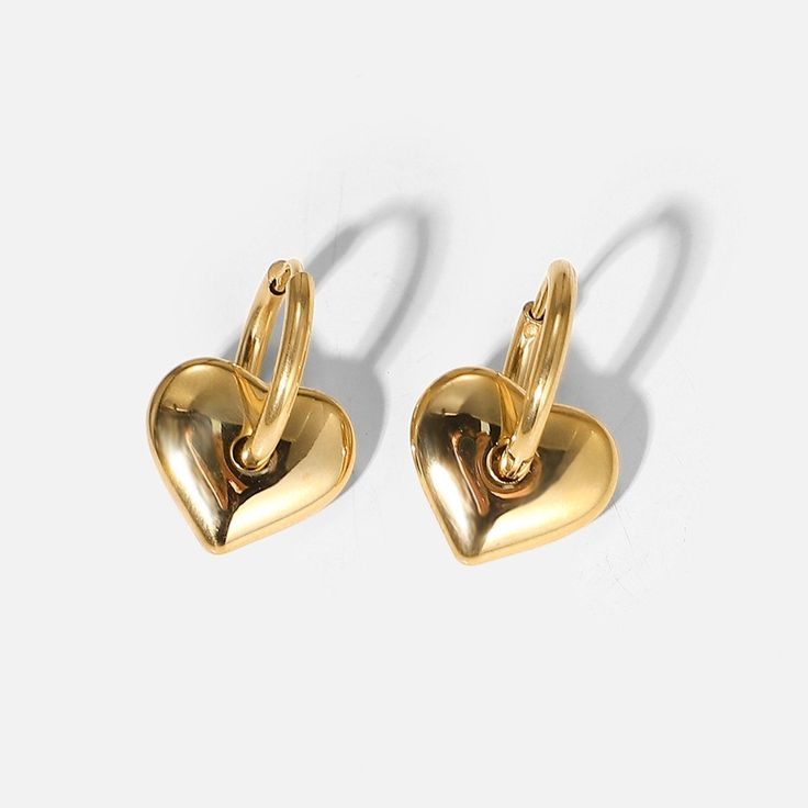 Embrace the sweet elegance of Heart Charm Earrings, beautifully crafted in 18k gold plating. These earrings feature charming heart charms, perfect for adding a touch of love and sophistication to any ensemble. Gold Heart Earrings, Gold Heart Earring, Heart Hoop Earrings, Huggie Hoop Earrings, Dainty Earrings, Sterling Silver Heart, Gold Heart, Heart Of Gold, Heart Earrings