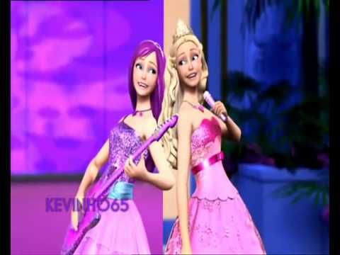 two barbie dolls standing next to each other in front of a purple wall and plant