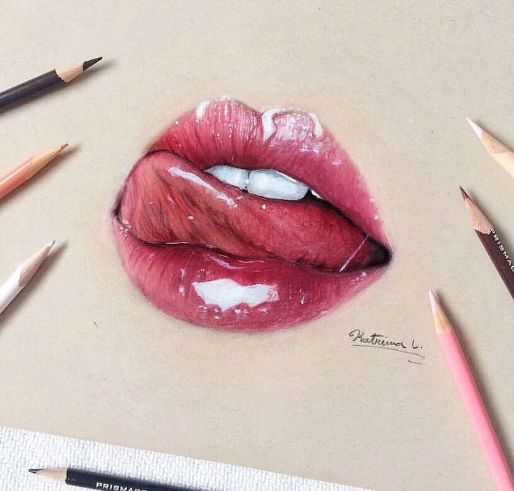 a drawing of a woman's mouth with lipstick on it and pencils next to it