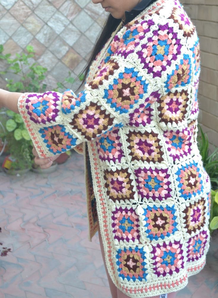 Handmade Crochet  Knit Colorful Winter  GRANNYs  sweater cardigan Measurements of this boho jacket cardigan gown : Size: Free size, i will send any size that you want Made of highest quality acrowool acrylic blend yarn Very stylish and fashionable  elegant and keeps you very warm Wash Instructions: Machine washable at low temperatures. -machine wash gentle (40 C/104 F) -tumble dry on low heat Unique designers print, handcrafted with love Great gift for yourself or for your loved ones Bohemian Long Sleeve Multicolor Cardigan, Bohemian Multicolor Long Sleeve Cardigan, Multicolor Long Sleeve Bohemian Cardigan, Granny Square Long Sleeve Cardigan For Festivals, Granny Square Long Sleeve Festival Cardigan, Long Sleeve Granny Square Cardigan For Festival, Festival Long Sleeve Granny Square Cardigan, Bohemian Multicolor Cardigan For Festivals, Bohemian Long Multicolor Cardigan