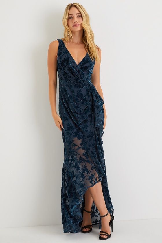 You'll have everyone fascinated with your effortless entrance in the Lulus Enchanting Impression Teal Blue Floral Velvet Ruffled Maxi Dress! Elegant woven chiffon, with an ethereal burnout velvet floral motif throughout, shapes a surplice neckline, wide tank straps, and a lightly gathered bodice with an alluring, deep V-back. Ruffle-trimmed skirt features gathering at the fitted waist before falling to an asymmetrical, high-low silhouette that ends at a maxi hem. Hidden back zipper/clasp. Fit: T Dark Blue Bridesmaid Dress, Jewel Tone Dresses, Formal Winter Wedding, October Wedding Guest Dress, Blue Wedding Guest Dress, Wedding Guest Dress Maxi, Dark Blue Floral Dress, Dark Blue Bridesmaid Dresses, Fall Formal Dresses