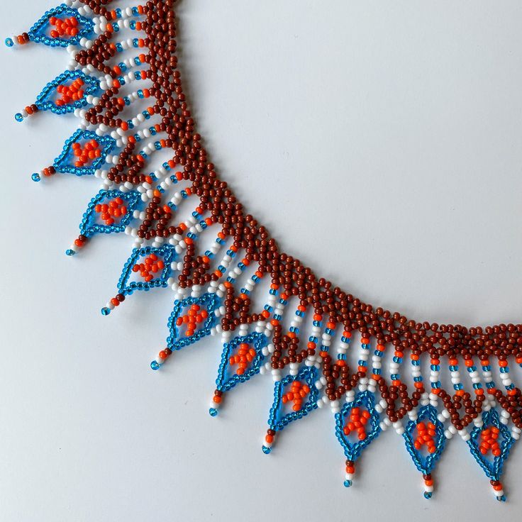 The Raices (Roots) Necklace will bring any neutral outfit to life with a burst of color! These necklaces are made by Arte Colibrí, Kamenstä Women Artisans from Sibundoy, Putumayo, Colombia. Details: - Material: Seed Beads - Ball and Loop Closure (look carefully, some have two loops for adjusting the size and some have only one). Burst Of Color, Neutral Outfit, Women Artisans, Seed Beads, Statement Necklace, Necklaces, Bring It On, Beads, Color