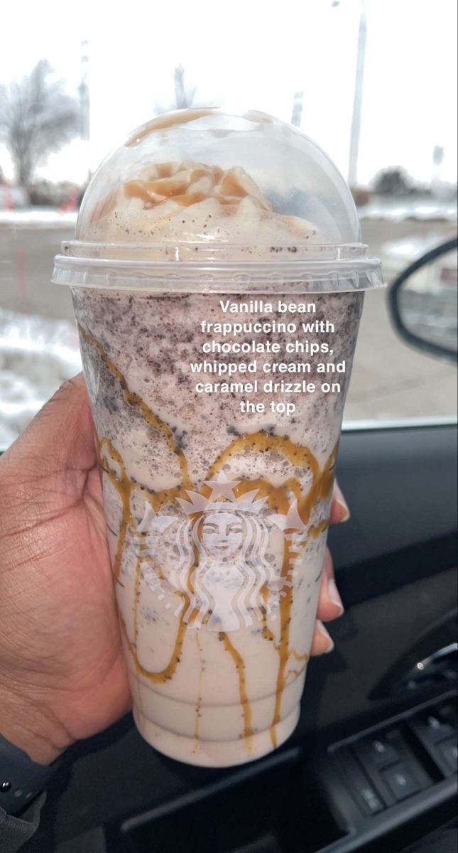 someone is holding up a cup with ice cream and coffee in it that says vanilla bean appetizing with whipped cream and wildflower cream and then the top